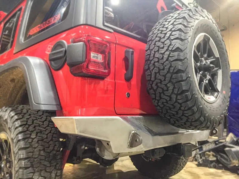 JL5502 – ARTEC INDUST Bumper, Rear One Piece Design Direct Fit With D-Rings Bare Steel